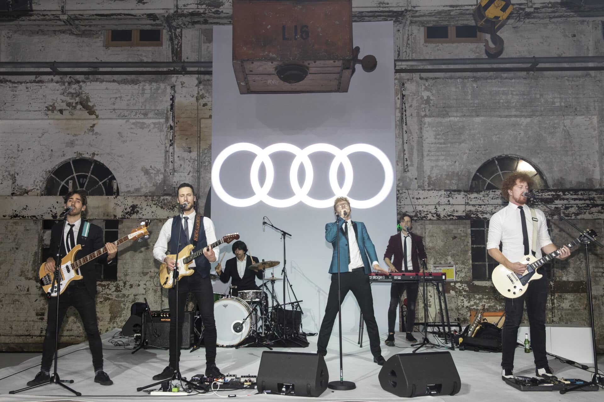 Guests enjoying Audi Dealer of the Year lounge experience with premium design details